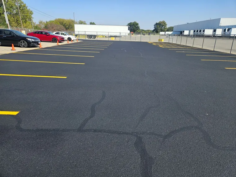 Asphalt seal coating and maintenance work
