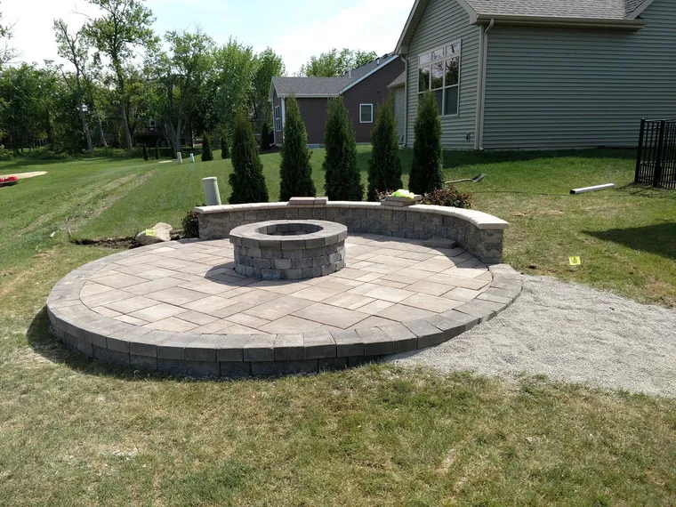 Custom hardscape fire pit and patio