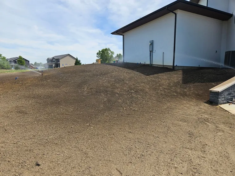 Irrigation system watering a healthy green lawn