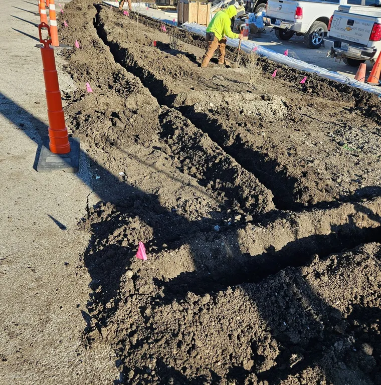 Machine trenching for irrigation and drainage lines