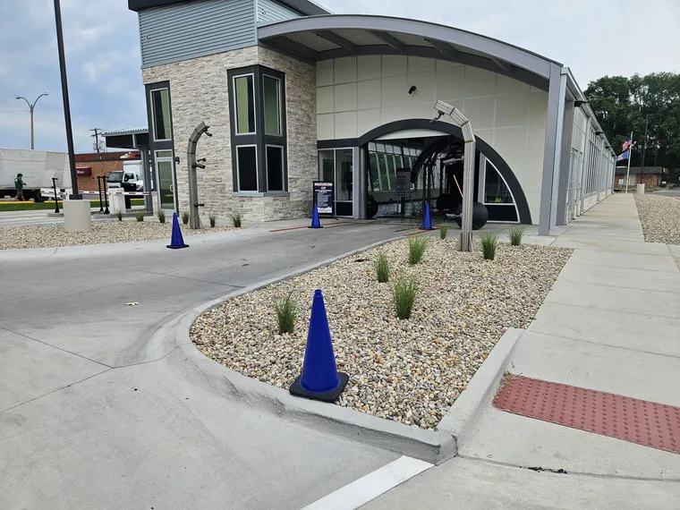 Commercial landscaping with plants and decorative rock